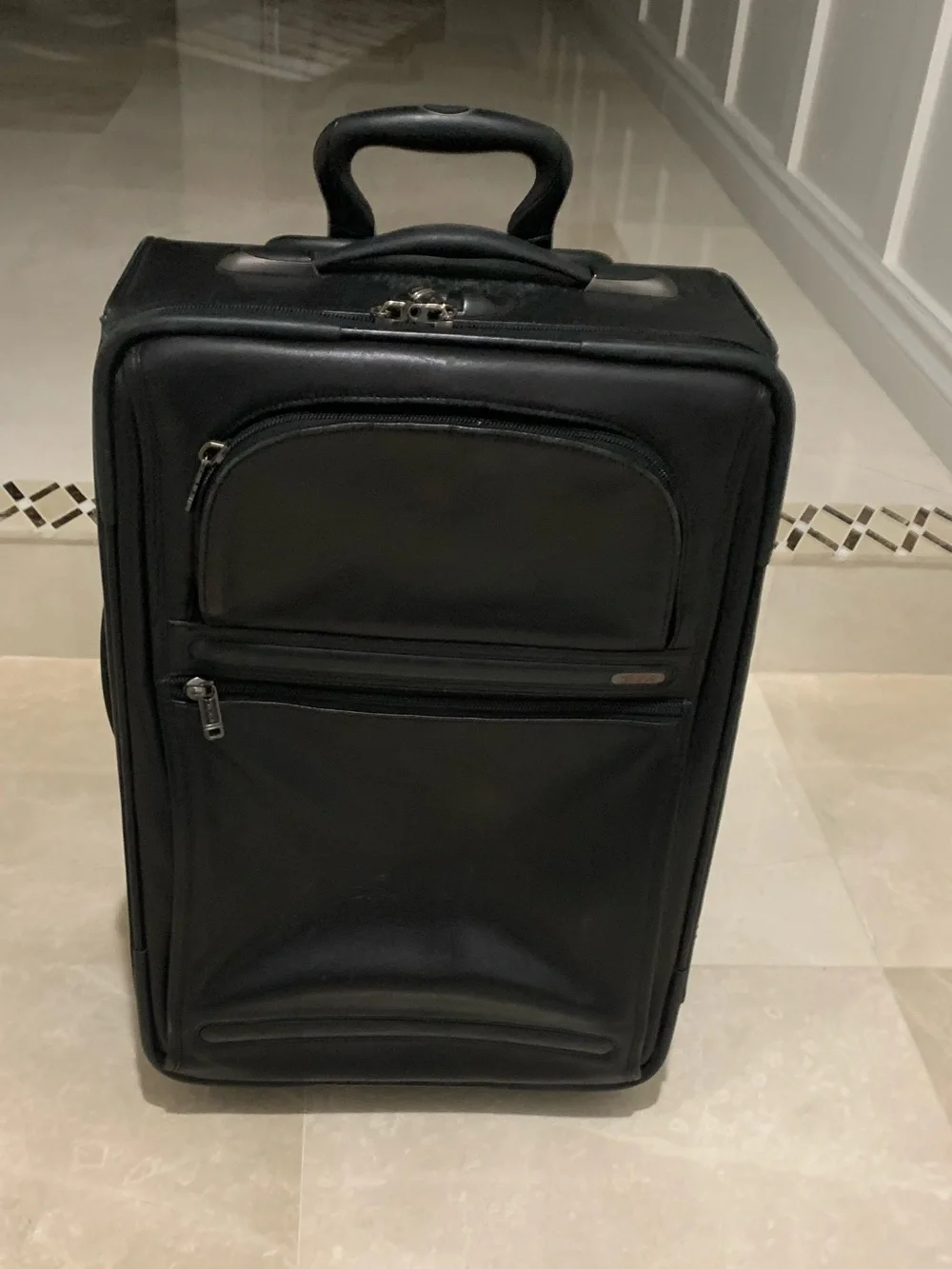 Tumi alpha leather